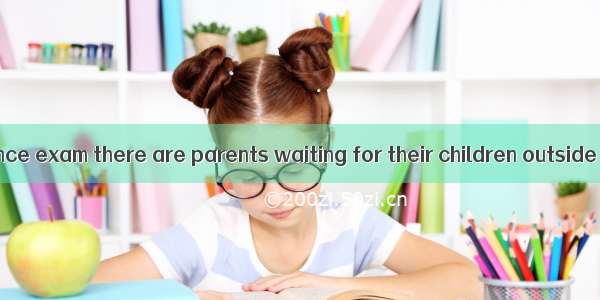 During the entrance exam there are parents waiting for their children outside the test cen